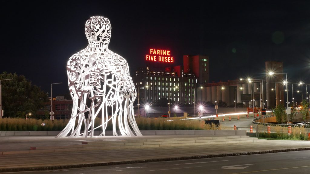 Sculpture man head and torso Montreal between Griffintown and Cité Multimédia Old Port